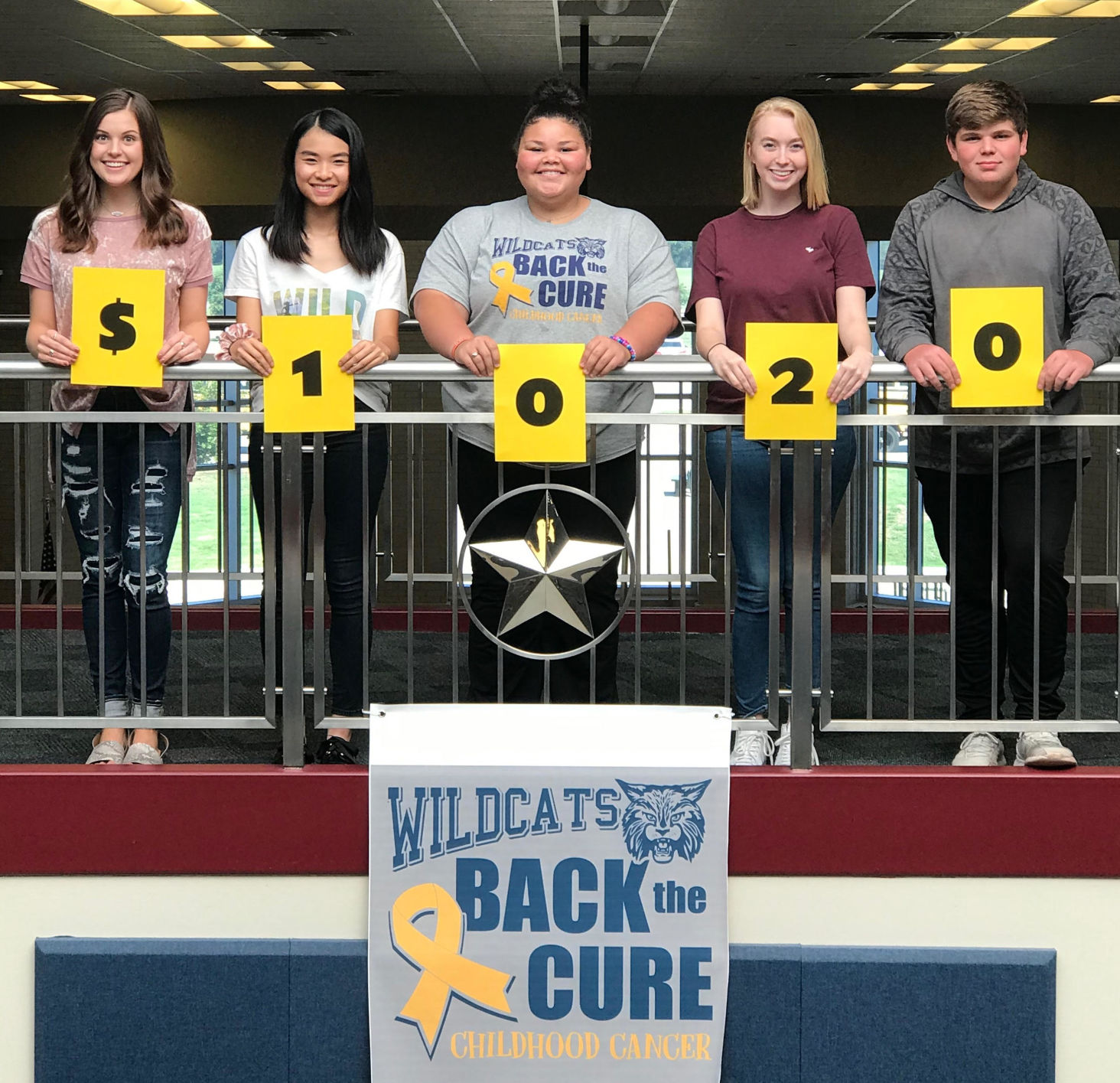 Paris High School students and staff donate funds for children who are battling cancer